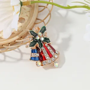 Sparkling Christmas bell brooch with colorful rhinestones and gold metal base