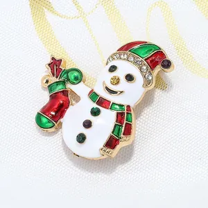 Luxurious Christmas snowman napkin ring with rhinestones and colorful enamel finish