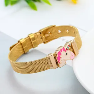 Detail of adjustable gold mesh bracelet featuring a colorful unicorn charm for kids