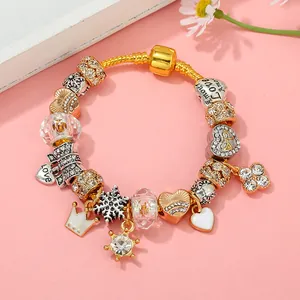 Golden snake chain charm bracelet with luxury crown, heart and clover pendant charms