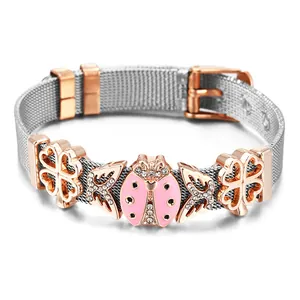 Edelstahl Mesh-Armband mit rosa Emaille-Marienkäfer und roségoldenen Schmetterling-Anhängern