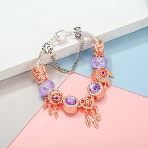 Bracelet attrape-rêves en or rose avec perles de cristal violet sur chaîne serpent