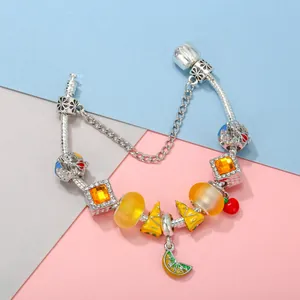 Silver snake chain bracelet with yellow glass beads and lemon pizza cherry charms