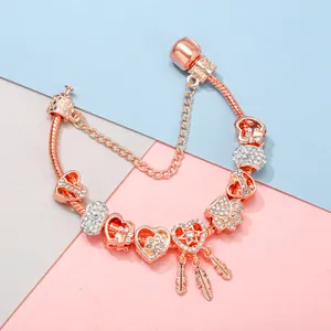 Rose gold dreamcatcher bracelet with hollow heart charms and sparkling crystal beads