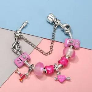 Pink glass bead bracelet with silver snake chain and heart-shaped kiss pendant