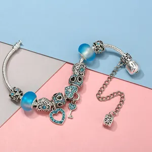 Pulsera de plata con cristales azules, colgante de corazón y llave para mujer elegante