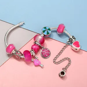 European style silver snake chain bracelet with pink glass beads and birthday charms