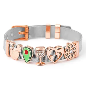 Bracciale a maglia oro rosa con ciondolo a cuore mappamondo e calice di cristallo