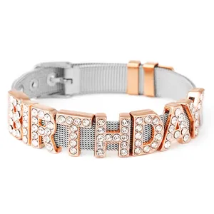 Detail of silver mesh band bracelet with rose gold Birthday charms and rhinestones