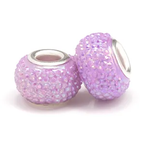 Sparkly purple resin charms with large metal grommets and rhinestones for DIY jewelry