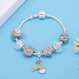 Beaded charm bracelet with white crystals and rainbow cloud pendant on snake chain