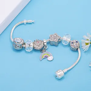 Elegant silver snake chain bracelet with crystal charms and moon star pendants