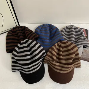 Fashionable striped knit peaked caps for women in multiple colors with retro visor design