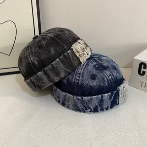 Retro washed denim miki hats in dark grey and blue with distressed raw edges