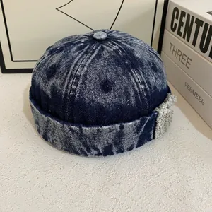Retro washed denim docker hat in navy blue with vintage texture for street style