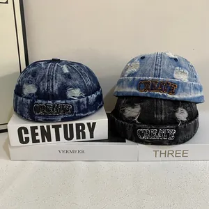 Vintage denim miki hat with distressed details and CREATE embroidery in multiple colors