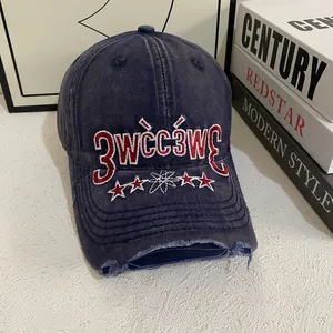 Vintage washed navy baseball cap with 3WCC embroidery and distressed brim detail