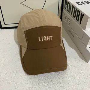 Detail view of two-tone five-panel camp cap with LIGHT 3D embroidery and durable fabric