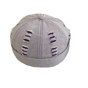 Berretto docker vintage in denim lilla con dettagli usurati e bordo arrotolato