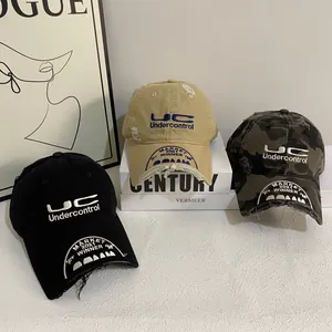 Distressed vintage baseball cap with embroidery in black, khaki, and camouflage colors