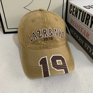 Vintage khaki baseball cap with LAZR NYO 1978 embroidery and 18 print detail