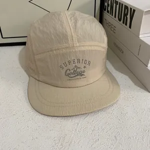 Detail of breathable quick-dry nylon camping hat with Superior College print