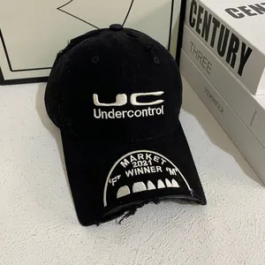 Distressed black cotton baseball cap with white 3D embroidery and vintage worn details