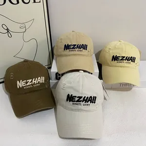 Distressed cotton baseball caps with NEZHA embroidery in khaki, coffee and beige colors