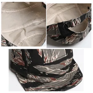 Detail of tigerstripe camo camper hat with ripstop fabric and adjustable back buckle strap