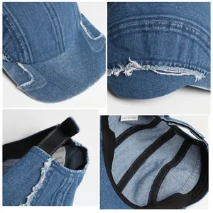 Detailansicht der gewaschenen Denim-Baseballkappe mit offenen Kanten und Klettverschluss