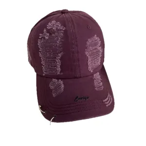 Distressed cotton baseball cap in deep purple with ring detail and Courage embroidery
