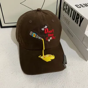 Brown cotton baseball cap with bottle opener brim and Don't Use Teeth embroidery