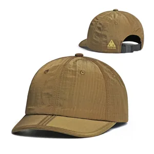 Detail of khakhi ripstop breathable fabric and adjustable buckle on soft summer baseball cap
