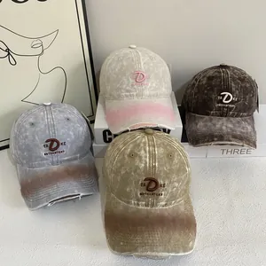 Vintage washed cotton baseball caps with 3D letter embroidery and distressed brim details