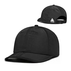 Detail view of black breathable ripstop nylon fabric and adjustable buckle on baseball cap