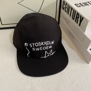 Pink flat brim baseball cap with cute cat embroidery and minimalist black fabric texture