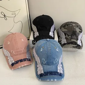 Distressed vintage baseball cap with wing embroidery and No Cap No Style slogan