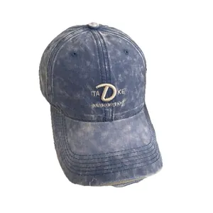 Retro washed denim baseball cap with embroidery and distressed brim in a vintage style