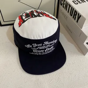 Vintage color-block baseball cap with artistic letter embroidery and flat brim design