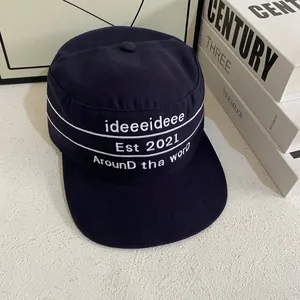 Navy blue flat top canvas military cap with white embroidery and street style design