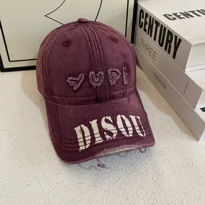Vintage burgundy washed baseball cap with 3D embroidery and distressed brim details