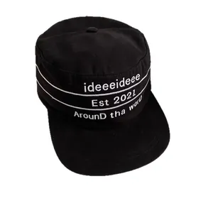 Retro black flat top military cap with white embroidered lettering and side stripes