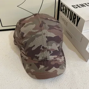 Short brim camouflage camp cap with ripstop texture in woodland pattern for men and women