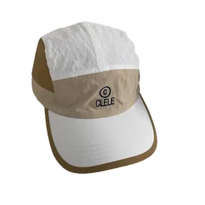 Three-color patchwork 5-panel outdoor camper hat with CLELE logo and quick-dry fabric