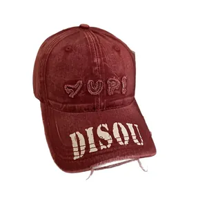 Vintage burgundy washed denim baseball cap with YUP embroidery and distressed brim details