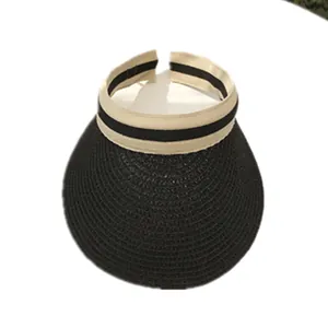 Women's black woven straw visor with striped beige ribbon for sun protection and travel