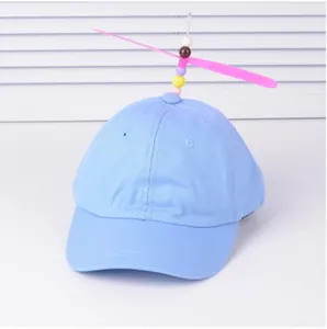 Light blue kids baseball cap featuring a colorful bead propeller and rotary dragonfly
