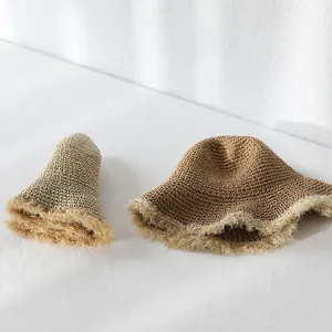 Handmade crochet paper straw sun hat for women with fringe brim and foldable design