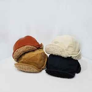 Gorros de aviador de invierno en lona con forro grueso de lana de cordero en cuatro colores