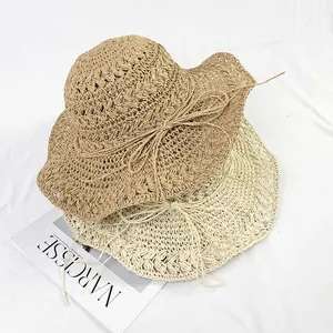 Handmade crochet straw hats in khaki and beige with bow tie ribbon for summer sun protection
